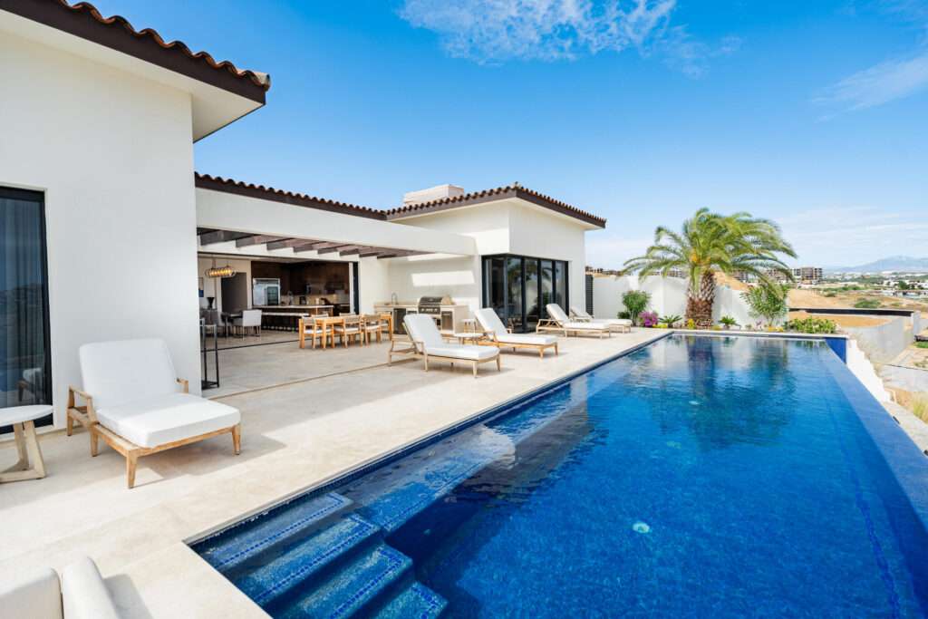 Coronado Cabo Coronado Live the Dream at Cielo Marbella in QuiviraExperience refined living in this exceptional home located within the prestigious Quivira community. Set in the exclusive enclave of Cielo Marbella, this 6-bedroom residence features 5 full bathrooms and 2 half bathrooms across 4,134.75 sq. ft. of air-conditioned interior space, offering a perfect balance of sophistication and comfort.This villa is in mint condition , ideal for family gatherings or rental opportunities . House and patio furniture is included in the asking price Designed for both relaxation and entertaining, the home showcases a heated infinity pool, jacuzzi, outdoor kitchen, fire pit, and a serene fountain—ideal for enjoying the Baja lifestyle for sale