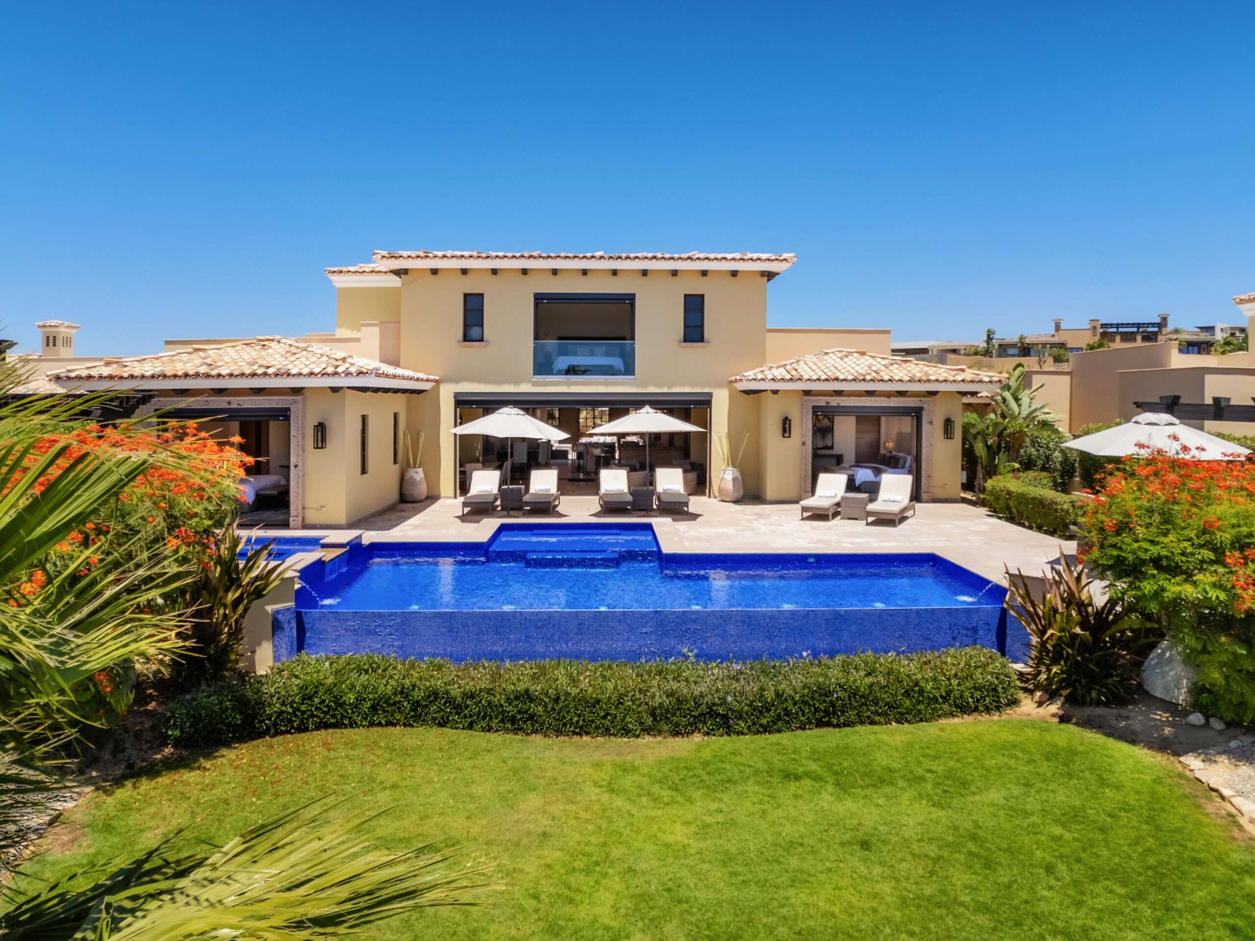 Coronado Cabo Golf Villas Overlooking the Tiger Woods designed Oasis 12-hole Short Course within Diamante Cabo San Lucas, this unique six-bedroom, six-bathroom contemporary hacienda-style residence offers a seamless blend of comfort, design, and natural surroundings.Upon entry, a private central courtyard welcomes you, with bedrooms thoughtfully arranged around it, creating both privacy and a strong sense of connection. The home flows naturally into an open-concept great room, where the kitchen, dining, and living areas come together around a warm fireplace, all opening onto a covered terrace.Designed to embrace Cabo's for sale