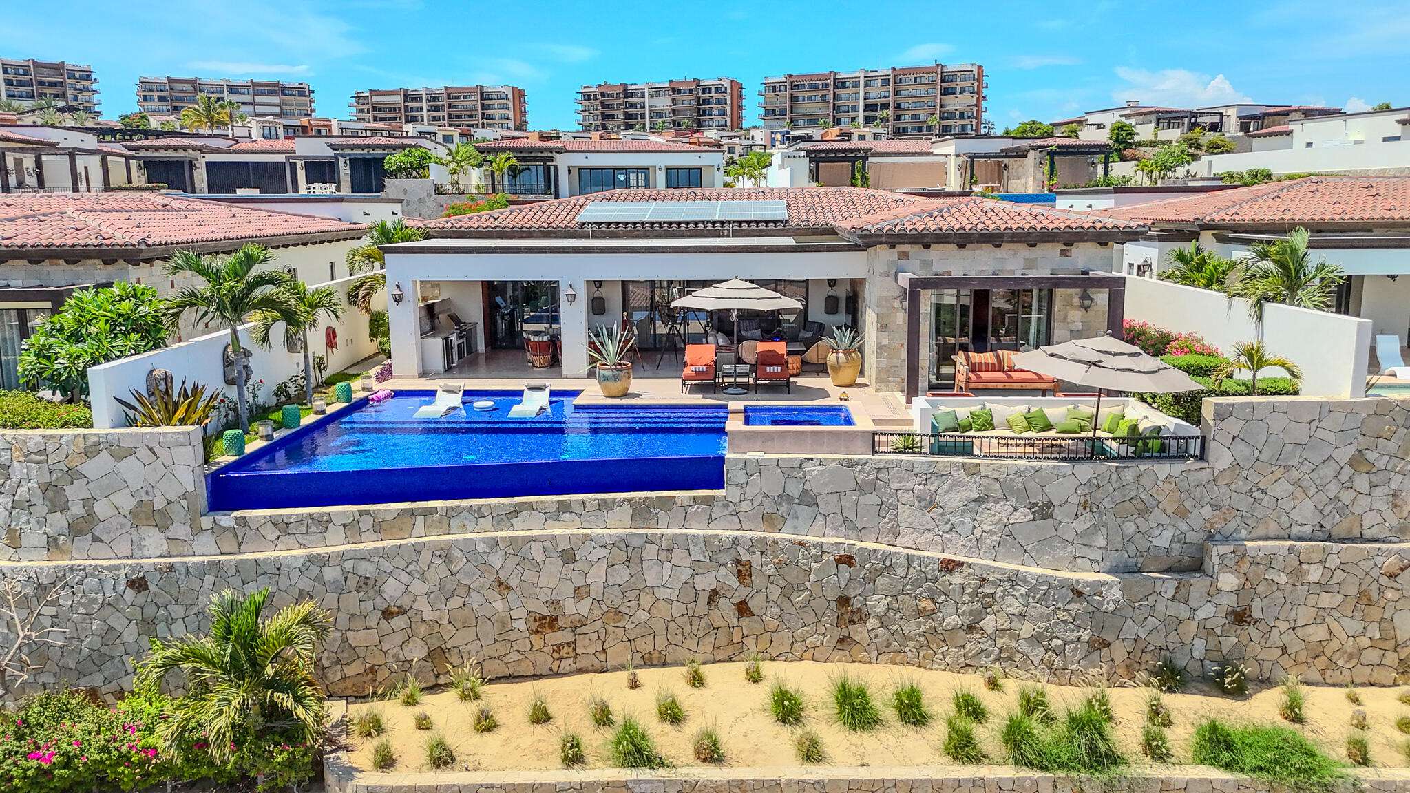 Coronado Cabo Coronado Nestled within the prestigious Quivira Golf and Resort community along Cabo's breathtaking Pacific Coast, Coronado 4.6 is a single-level Hacienda-style residence that embodies refined coastal living.This beautifully designed home features four spacious bedrooms, soaring vaulted ceilings, and seamless indoor-outdoor transitions that invite the beauty of the ocean into every space. Expansive outdoor living areas - including a private pool, jacuzzi, wood burning fireplace, fire table, and multiple lounge spaces - are perfectly positioned to capture uninterrupted ocean for sale
